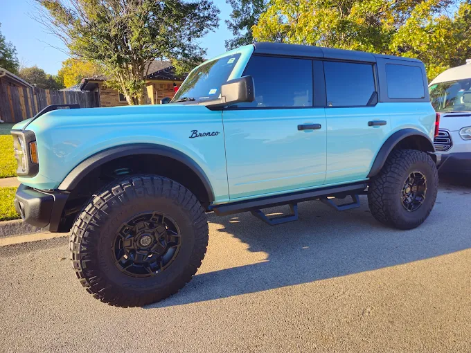 Light blue Ford Bronco detailed and shining