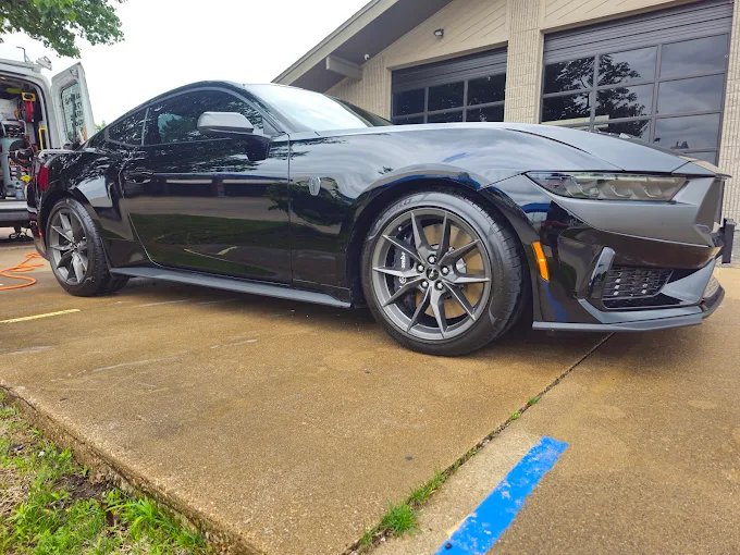 Black Ford Mustang Dark Horse with deep gloss after paint correction